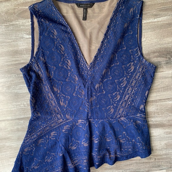 BCBGMaxAzria Tops - BCBG Asymmetrical top size Large.